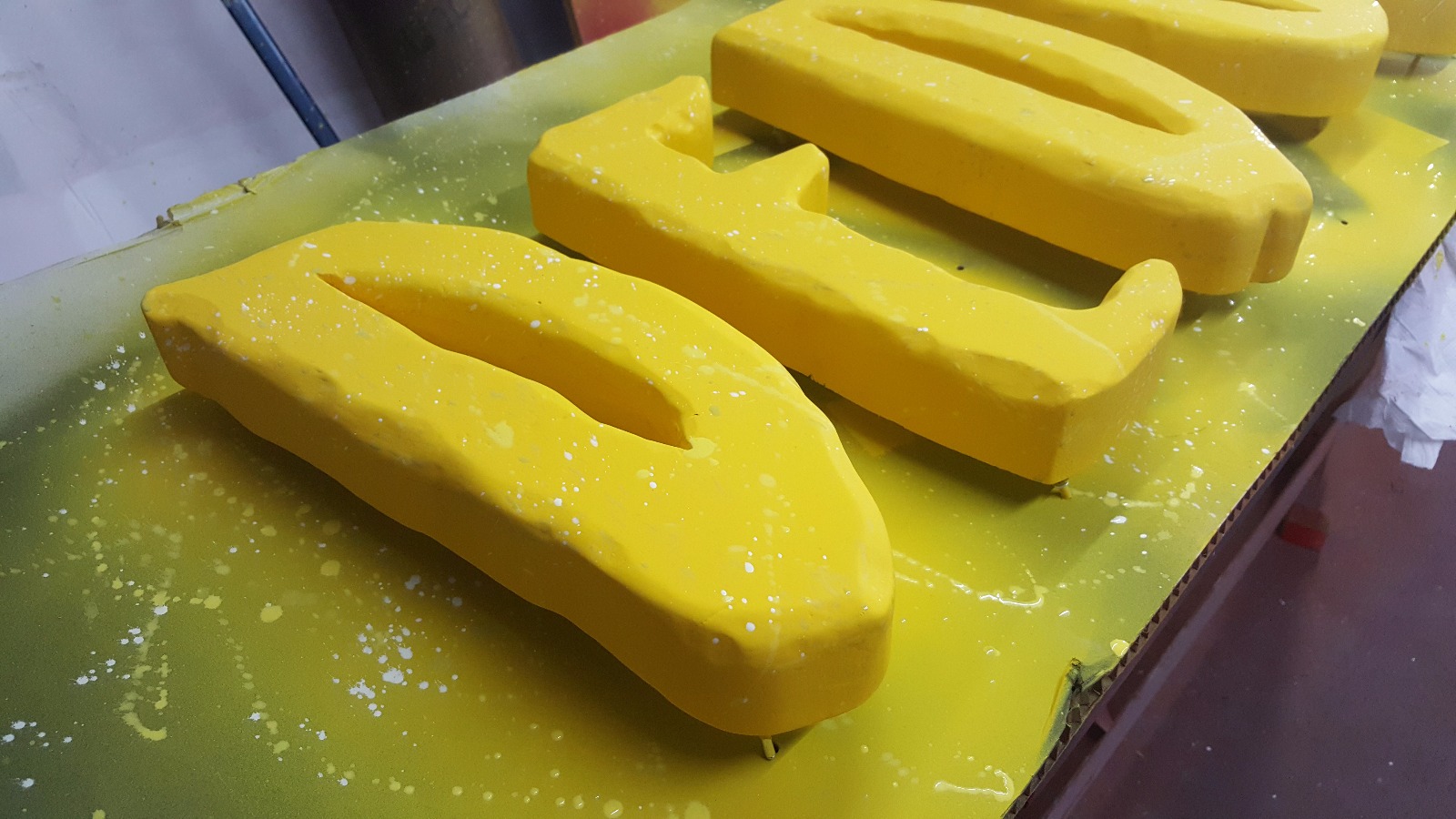 3D Yellow Signage Production